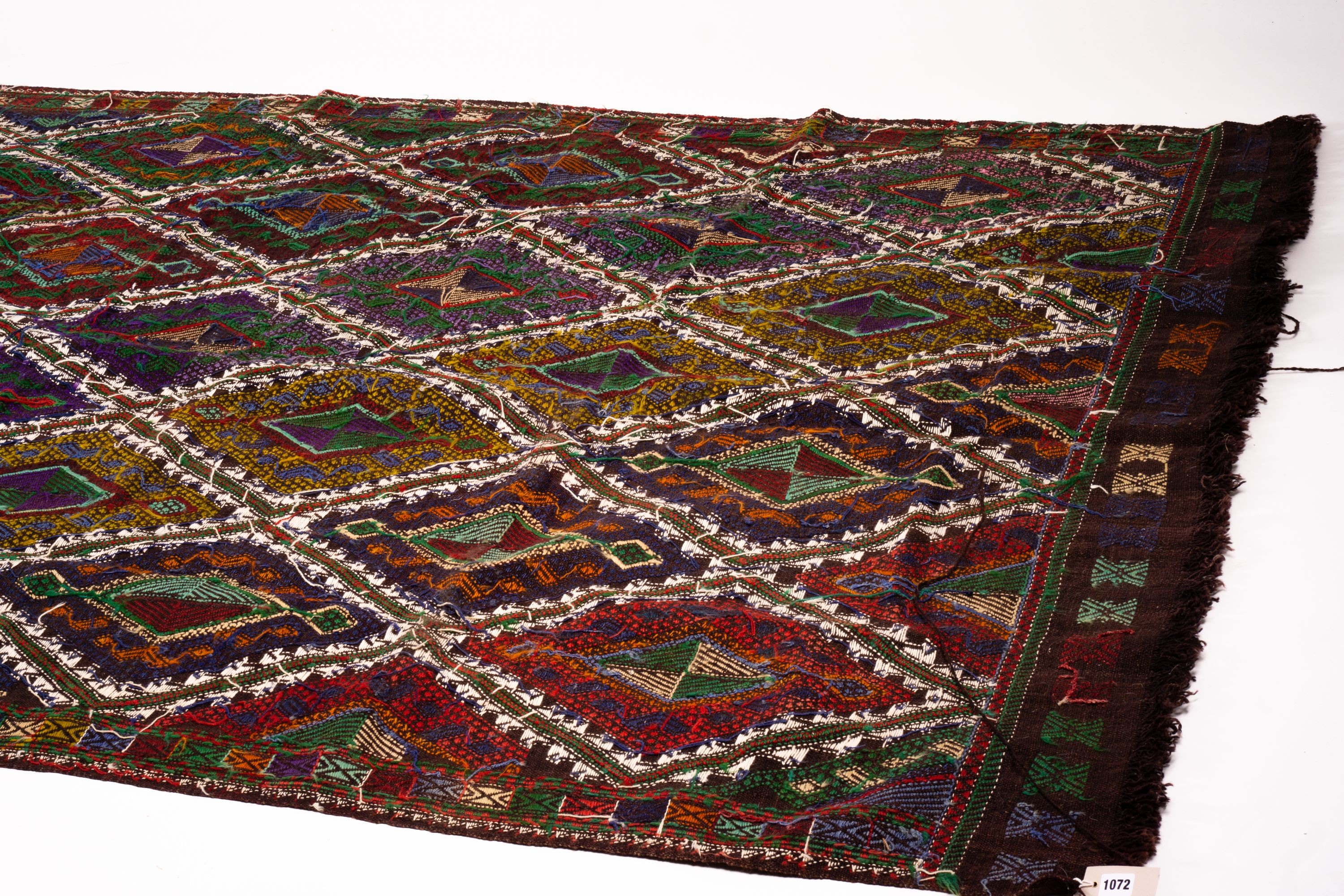 A Moroccan wool tile pattern rug, 240 x 160cm